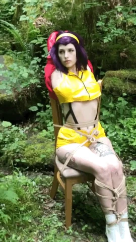 Cosplayer tied up in the woods