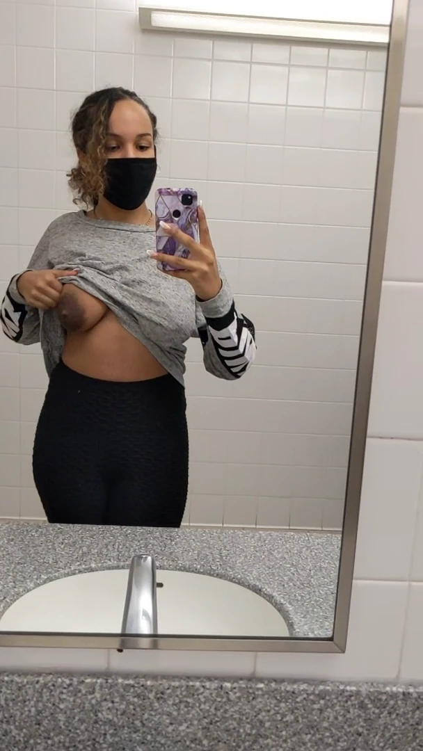 Showing off my teen DDs in the public restroom